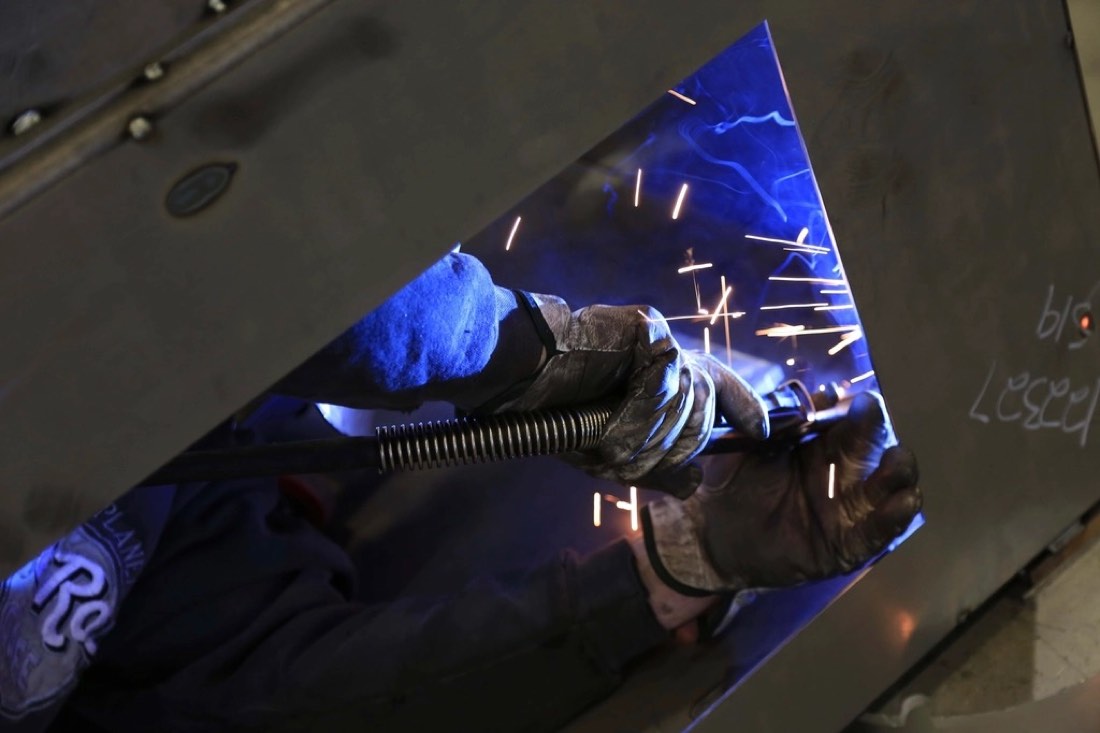 Close-up of a MIG welding arc throwing sparks
